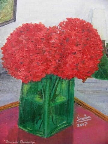 Ixora in a green vase